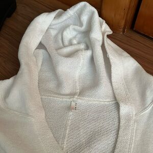 Free People Movement hood sweatshirt 
Cropped cream color